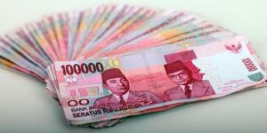 merusak uang rupiah